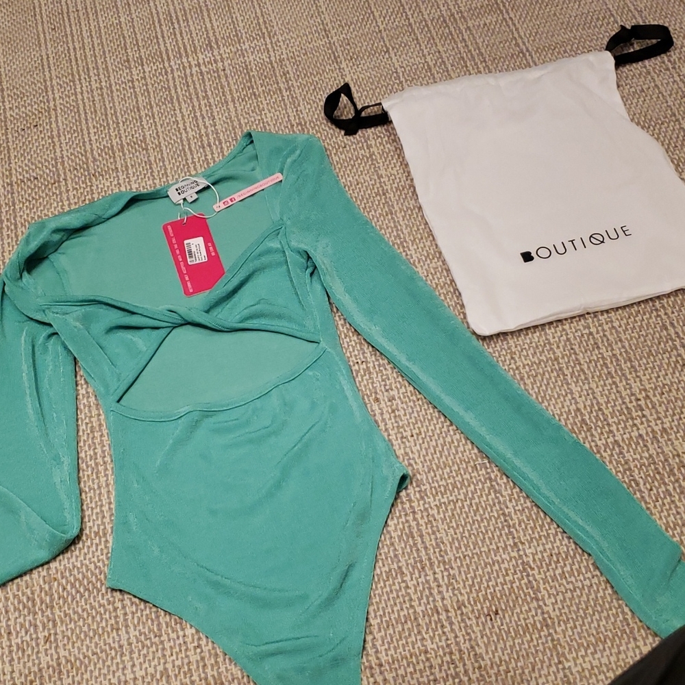 Beginning Boutique,green body suit, size 6, New with Tags.